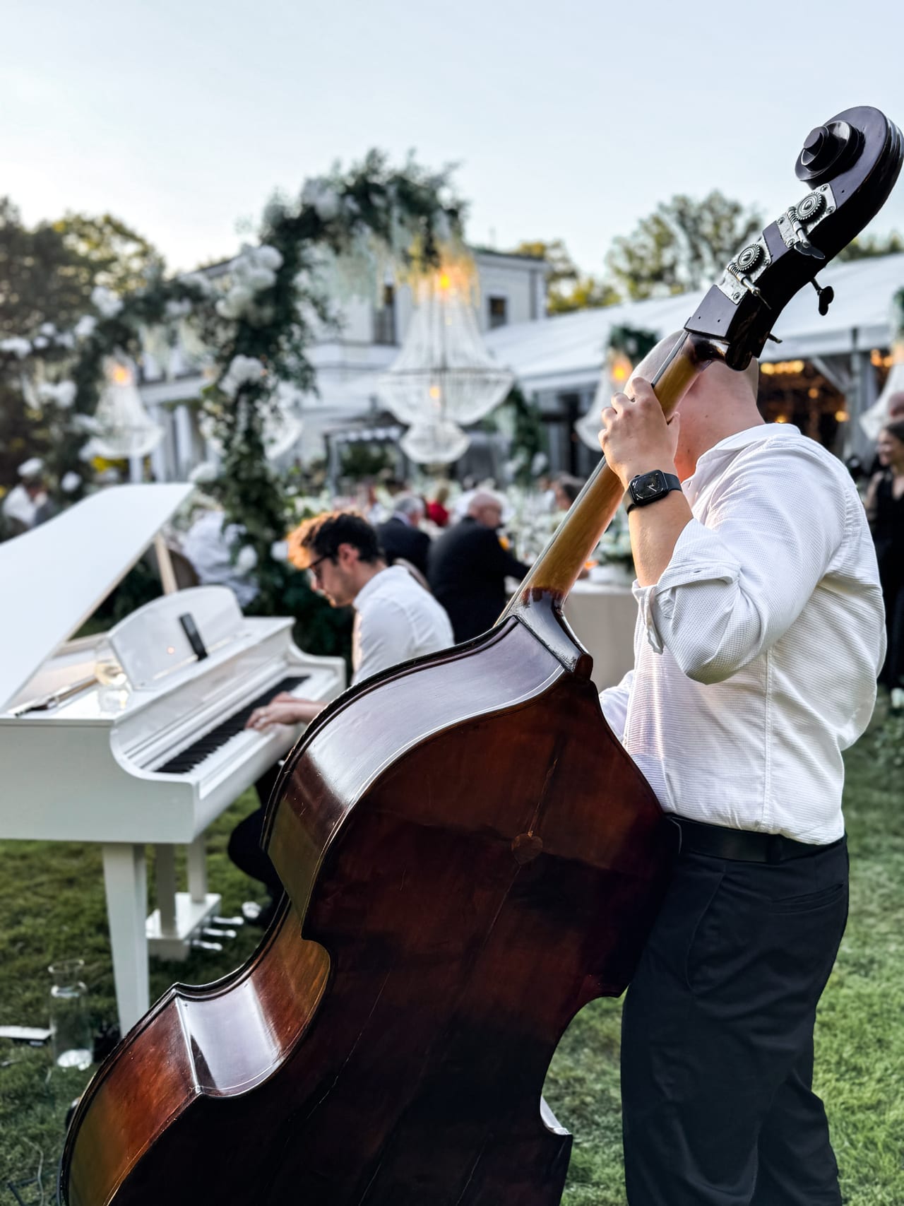 A musical duo during the cocktail hour and the wedding wishes